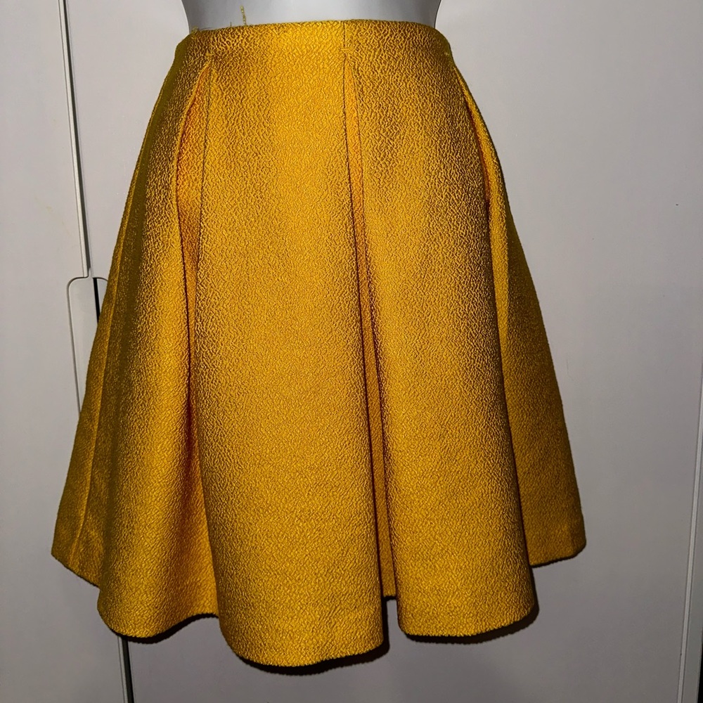 Yellow pleated skater skirt